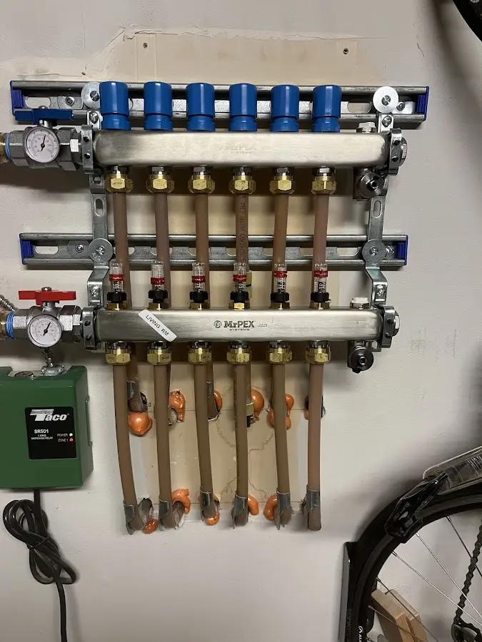 Plumber performing Gas Line Installation at a residential property in Elk Grove Village